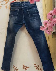 Distressed Dark Wash Denim Jeans
