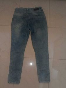 Distressed Denim Jeans with Cutout Detail