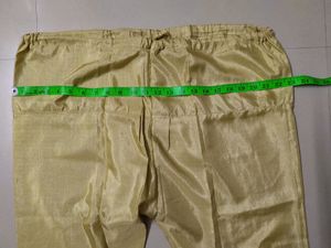 Unused Green And Gold Floral Net Chudidhar