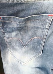 Distressed Blue Denim Jeans