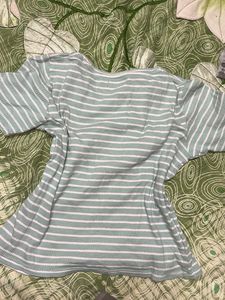 green and white striped top