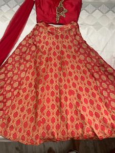 Sleeveless Red Lehenga And Choli
