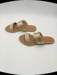 Tan And Gold Flat Sandals.