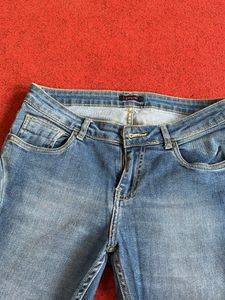 Distressed Denim Jeans