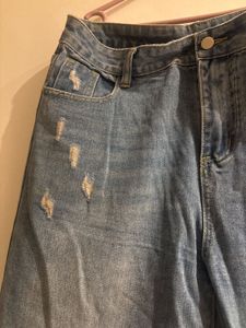 Ripped Knee Denim Jeans