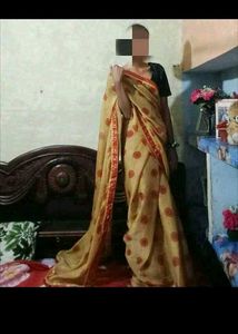 Elegant Beige Saree with Red Accents