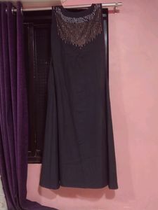 Long Black Gown With Some Design On Neck