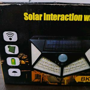 Solar Interaction Wall Light