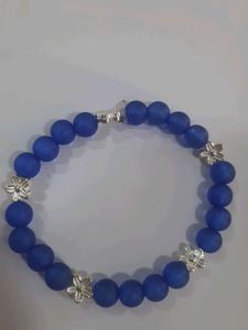 Blue Beaded Bracelet with Silver Flowers