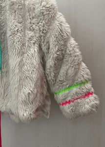 white fur jacket