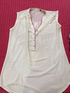 White Sleeveless Top