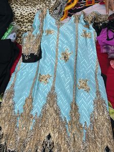 Brasso Suit With Black Salwar And Net Dupatta