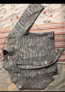 Off White Top, Black Cut Out With Glitter On I
