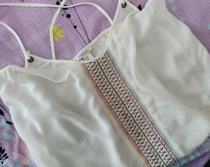 sleeveless top ,bust size-36,goes well on jeans and skirts