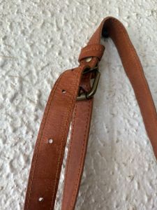 Leather Sling Bag With Hand Work On It