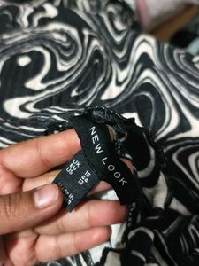 141511. Swirl Print Long Sleeve Bodysuit