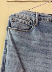 Ripped High-Waisted Jeans
