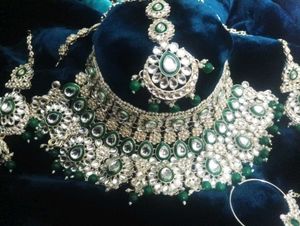 bridal jewellery set in green trending jeweller