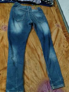 Ripped Blue Denim Jeans