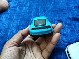 Teal Porsche Toy Car