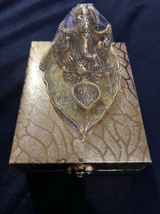 Ganesha Idol in Wooden Shrine.