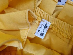 Yellow Ruffled Off-Shoulder Top