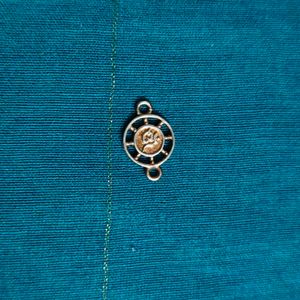 92.5 Om Charm