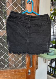 Ripped denim skirt