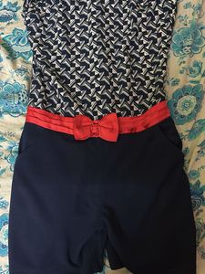 Navy Blue Sleeveless Striped Jumpsuit | Knee-Lengt