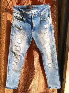 Distressed Denim Jeans