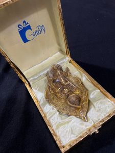 Ganesha Idol in Wooden Shrine.