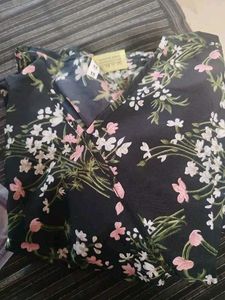 Black floral peplum top