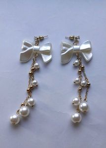 Pearl Bow Dangle Earrings