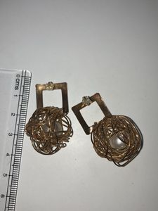 Gold Pearl In Sphere Earrings