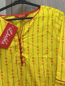 Yellow Printed Kurta And Red Pallazzo