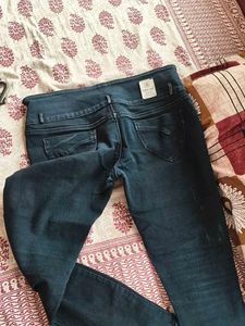 Ripped High-Waisted Jeans