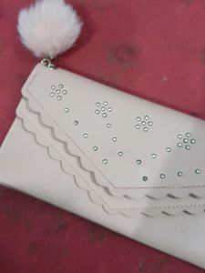 A Very Beautiful Handbag In Peach Colour