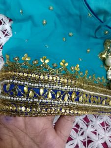 party wear saree firozi colour saree &amp; dark blue border with beautifu work as per showing in pic full length saree blouse size mention in pic