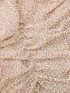 nude floral ruched mini dress with puff sleeves