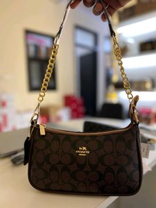 Coach Slings In Stock