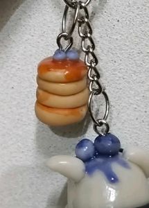 Cute zebra striped pug and pancake keychain