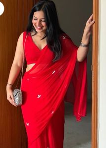 Elegant Red Saree with Embellishments