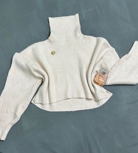 Cream Turtleneck Sweater