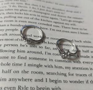 Silver diamond rings.