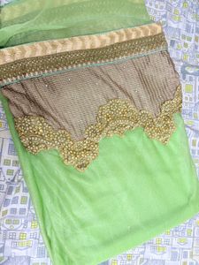 Lime Green Net Saree With Golden Trim