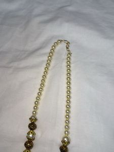 Heavy Pearl Necklace.