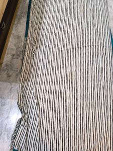 Green,red,black and white standard saree.