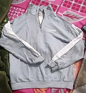 Casual Outfit: hoodie and a black v neck sweater