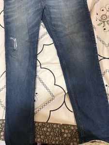 Distressed Denim Jeans