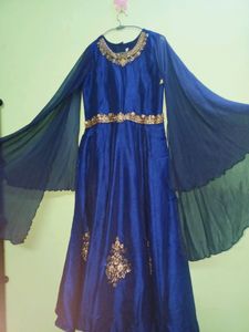 Festive Gown With Extended Cape Sleeves